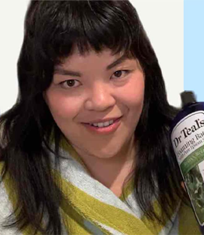 Jen Phamous holding Dr Teal's Foaming Bath product