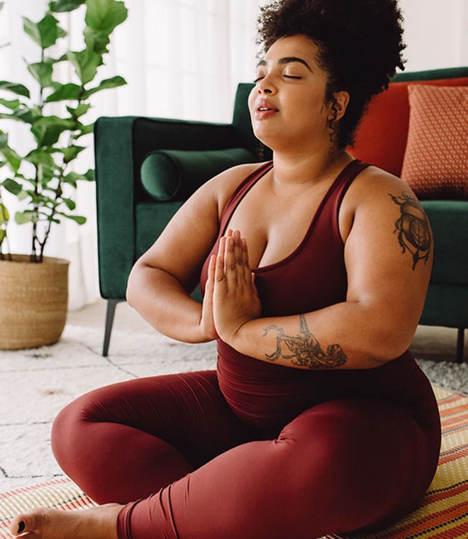 Young black woman doing yoga