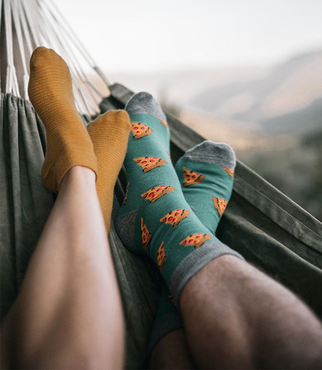 Feet with socks on in a hammock