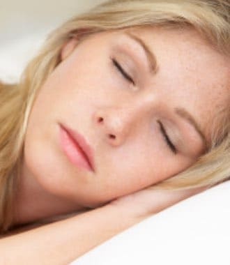 Thumbnail image of woman with blonde hair sleeping