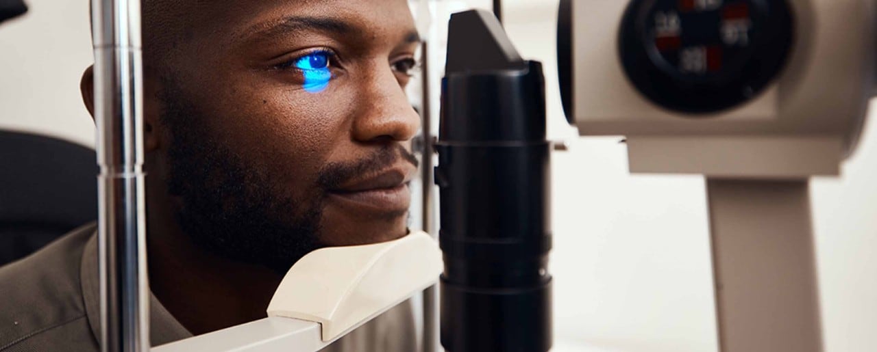 Black man getting an eye test