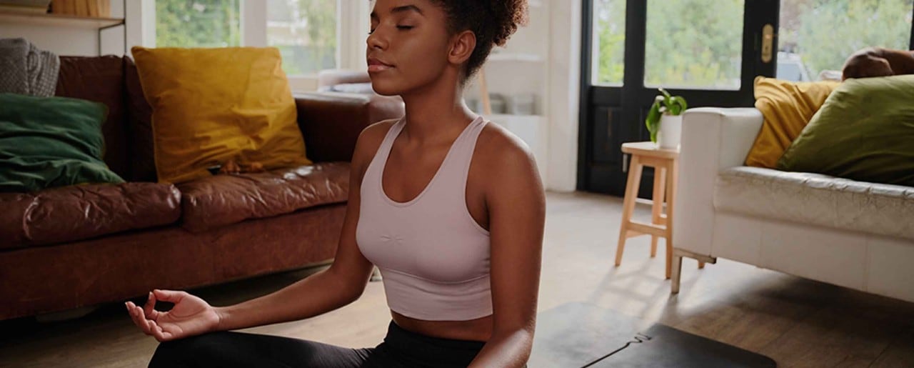 Young black woman meditating